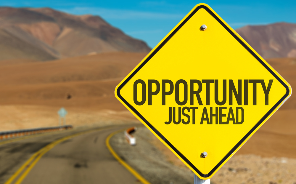 sign that says opportunity just ahead